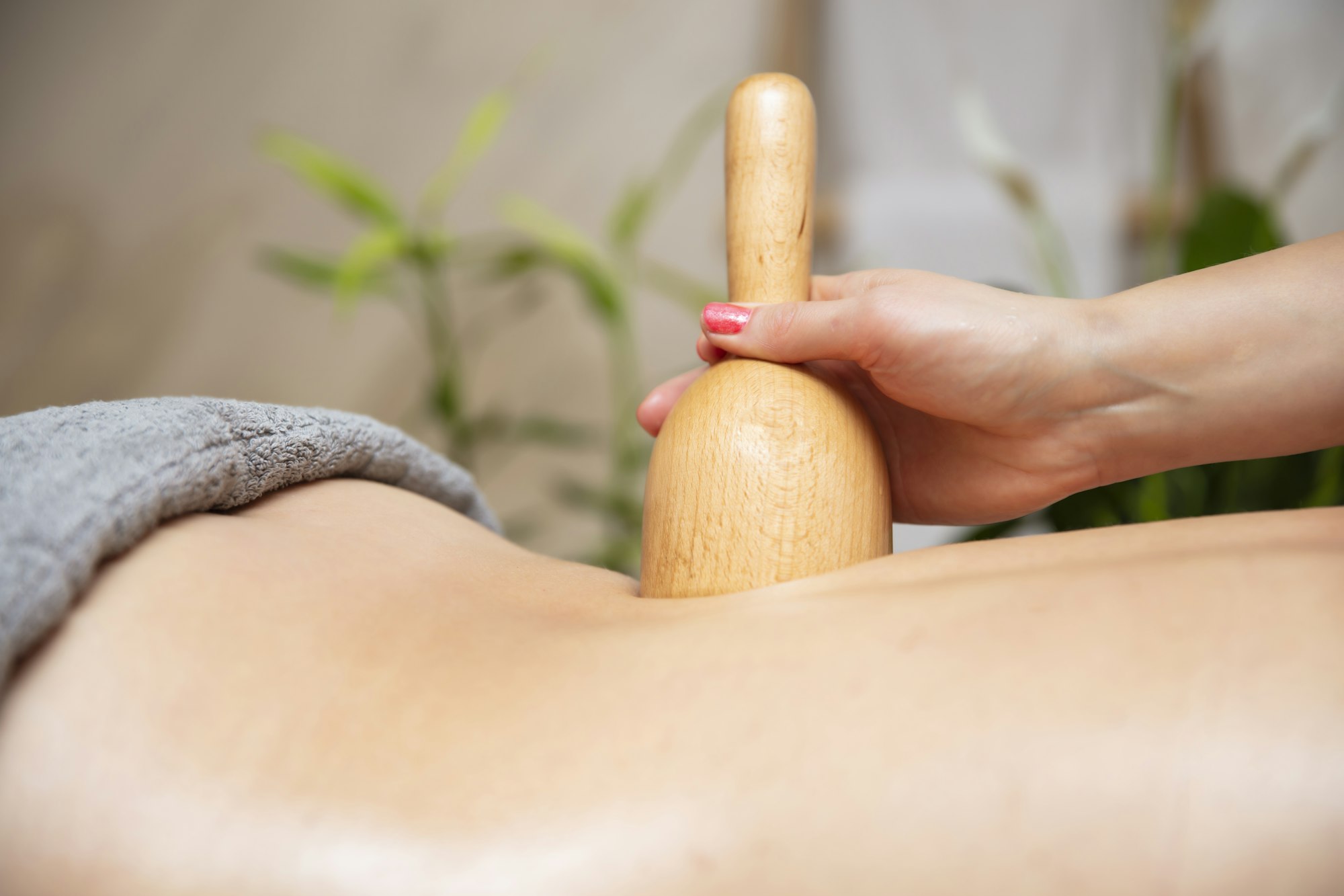 Maderotherapy massage with wooden swedish cup